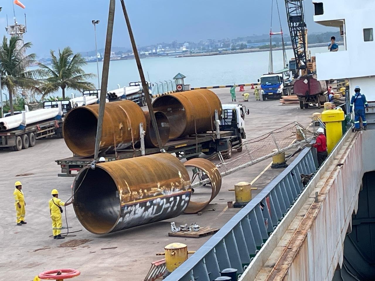 Crane lifting heavy cargo dockside