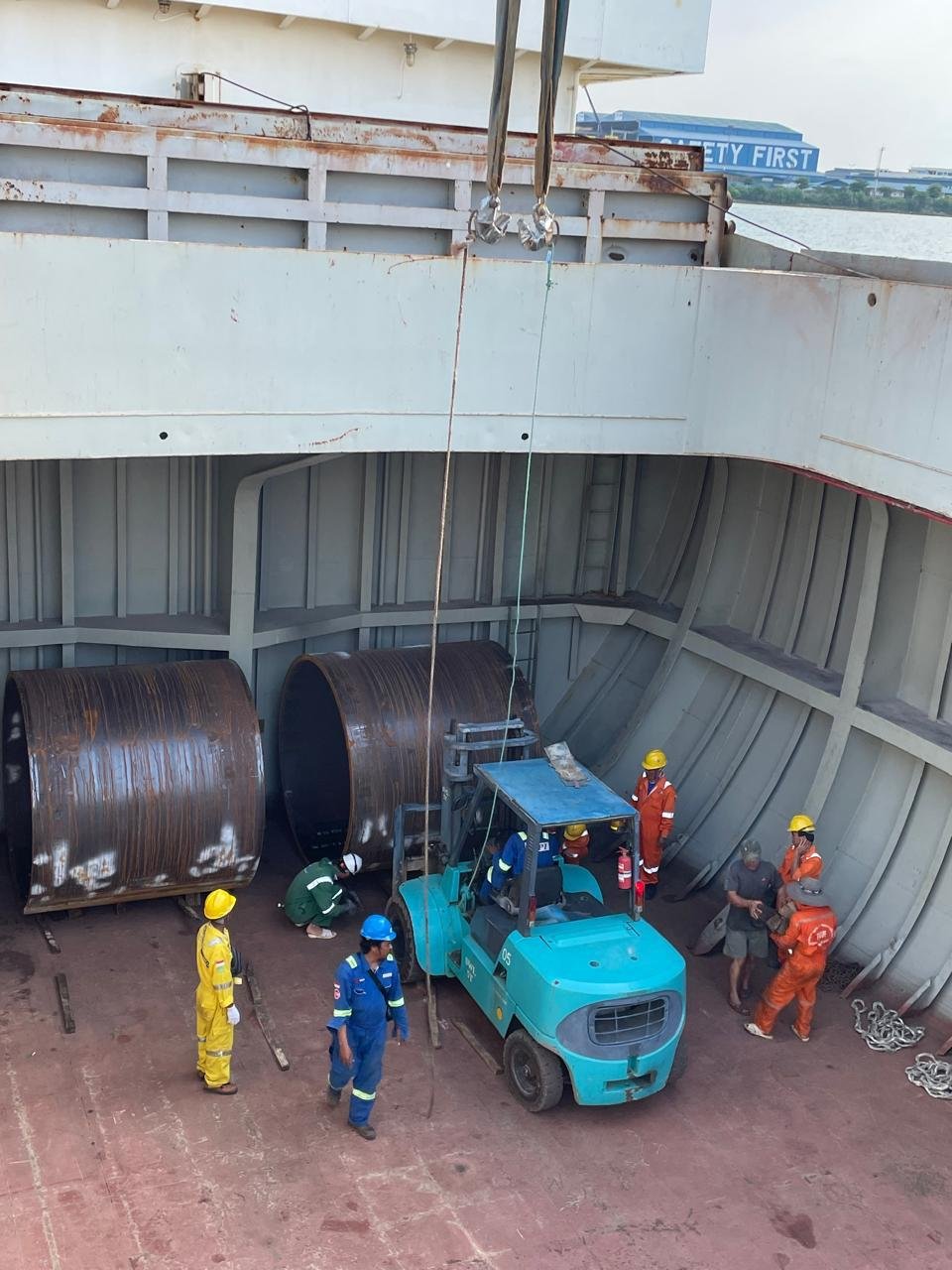 Cargo being lowered into a ship's hold